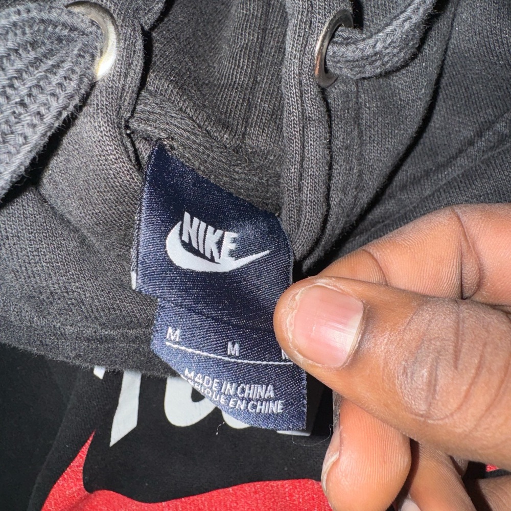 Used nike hoodie size medium in boys all black lowest offer is 20